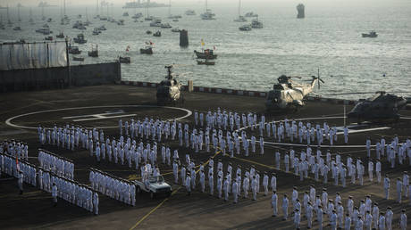 Indian Navy personnel during Ceremonial Parade for Change of Command of FOC-IN-C (West) at INS Shikra, on November 29, 2021 in Mumbai, India.