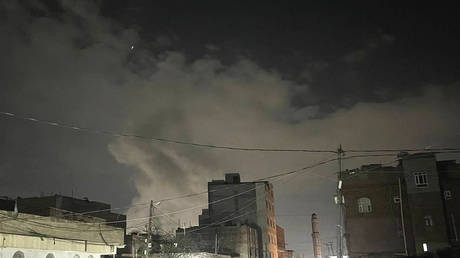 Smoke rises after a series of airstrikes on the capital, Sanaa, Yemen on March 15, 2025.