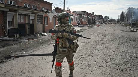 A Russian soldier in Sudzha, Russia following the city’s liberation from Ukrainian troops on March 15, 2025.